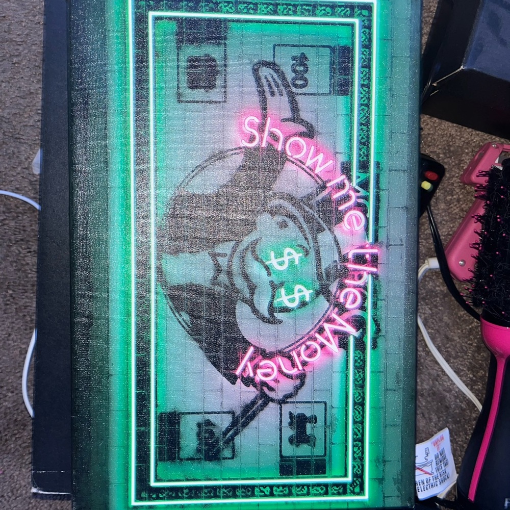 Show me the money canvas with monopoly man